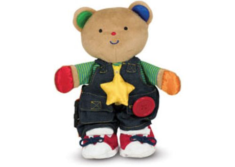 Plush bear Teddy Wear with removable clothing for developing self-care skills and fine motor abilities in toddlers.