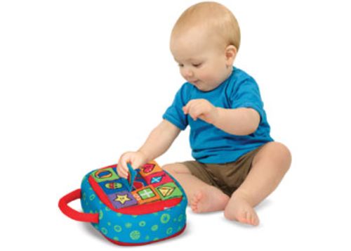 Colorful Melissa & Doug Take-Along Shape Sorter with nine shapes, plush dog, and padded case for portable learning fun.