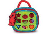 Colorful Melissa & Doug Take-Along Shape Sorter with nine shapes, padded case, and plush dog, perfect for toddlers' learning.