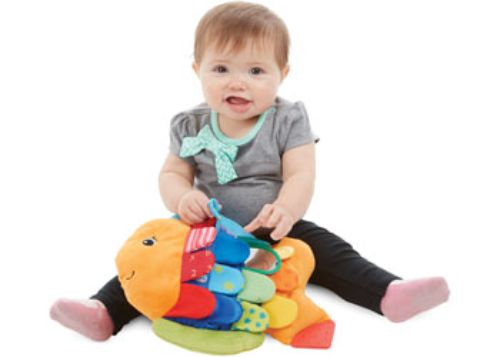 Colorful Melissa & Doug Flip Fish, a sensory toy with crinkly textures and squeaks, perfect for babies' exploration and development.