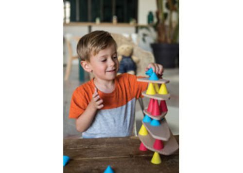 Colorful silicone cones and sturdy wooden boards from the Piks Small Kit create fun, imaginative construction play for kids.