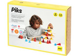 Colorful Piks Small Kit construction toy with 24 pieces, including silicone cones and wooden boards for creative play.