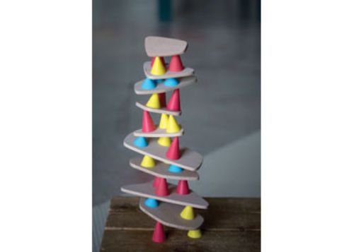 Piks - Medium Kit featuring colorful silicone cones and sturdy wooden boards for creative, constructive play and skill development.