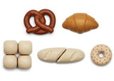 Wooden Bread Set by PlanToys featuring assorted realistic bread types, promoting imaginative play and fine motor skills for kids.