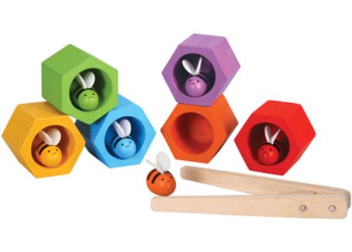 Colorful educational toy featuring bees and hives, designed to enhance fine motor skills and color recognition for kids 3+.