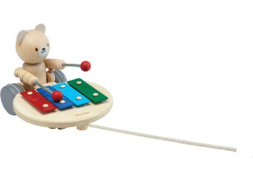 Wooden Pull-Along Musical Bear toy, eco-friendly, promotes music play, motor skills, and social interaction for toddlers.