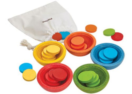 Colorful stacking cups designed for toddlers to enhance sorting, counting, and fine motor skills through playful learning.