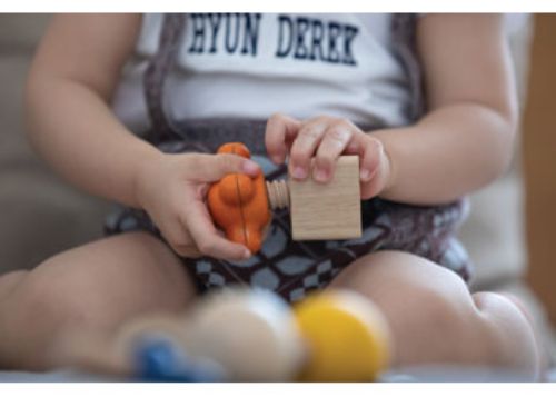 Colorful, eco-friendly Nuts & Bolts set for toddlers, enhancing fine motor skills and imaginative construction play.