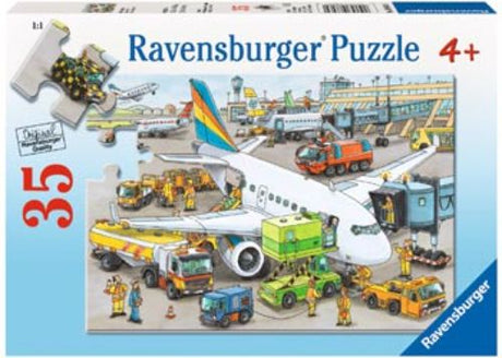 Colorful Ravensburger Busy Airport Puzzle for kids, featuring a lively airport scene with planes and passengers. 35 pieces, 30 x 21 cm.