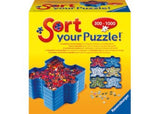 Ravensburger Sort Your Puzzle features interlocking trays for organizing pieces by color, ideal for travel and easy assembly.