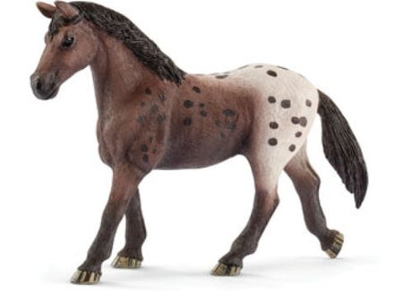 Hand-painted Schleich Appaloosa mare model showcases unique coat patterns, perfect for collectors and imaginative play.