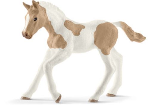 Schleich Paint Horse Foal figurine featuring realistic patches, perfect for imaginative play and collecting.