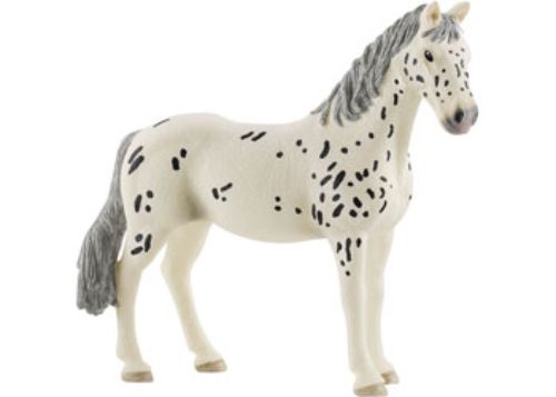 Detailed Schleich Knabstrupper mare figurine with a spotted coat, perfect for imaginative play and education for young horse lovers.