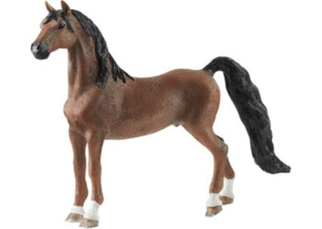 Intricately detailed Schleich American Saddlebred gelding figurine, showcasing proud head carriage and elegant curved tail.