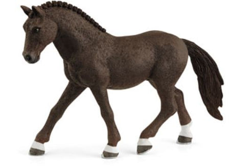 Schleich German Riding Pony Gelding with braided mane, slender legs, and detailed craftsmanship for collectors and imaginative play.