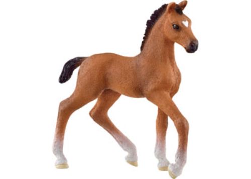 Schleich Oldenburger Foal figure featuring a glossy coat and detailed features, perfect for children's imaginative play and learning.