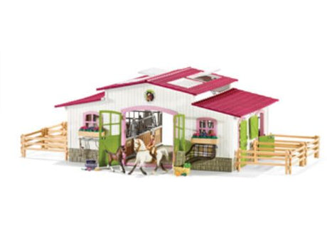 Vibrant Schleich Riding Centre playset featuring stalls, horses, and an open arena for imaginative equestrian adventures.