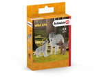 A detailed figurine set of a nurturing mother wolf with her playful pups, perfect for imaginative and educational play.