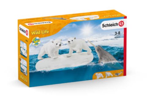 Schleich Polar Playground playset featuring playful polar bears, an ice floe, and a friendly narwhal in a snowy Arctic scene.