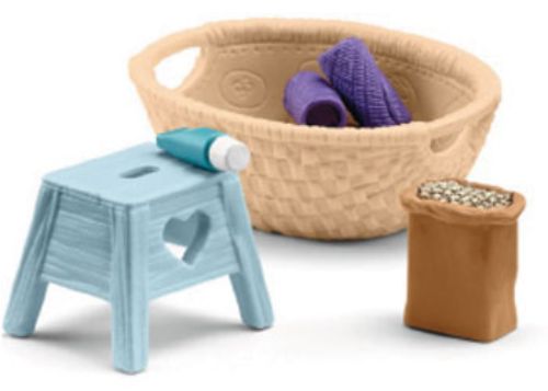 Colorful Schleich animal care accessories for imaginative play, featuring grooming kits and feeding sets for young animal lovers.