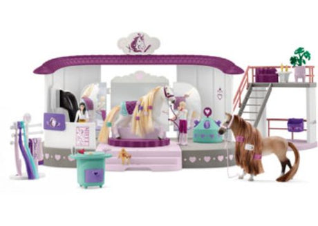 Colorful playset featuring horse grooming tools, saddles, and figurines for imaginative horse care adventures.