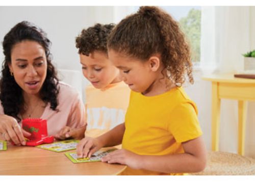 Interactive Zingo! game with double-sided cards and tiles, enhancing word skills for ages 3 and up during family game nights.