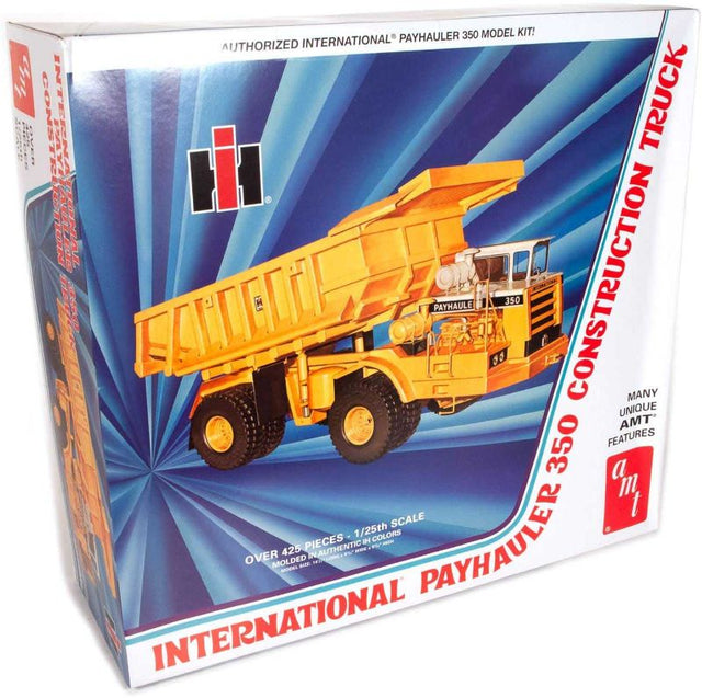 Detailed AMT 1/25 IH Payhauler 350 model kit featuring large tires, steerable front, and functional dump body for collectors.