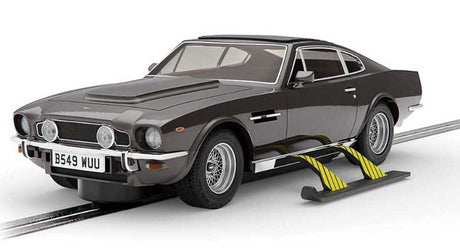 Slot car model of the iconic Bond Aston Martin V8, featuring skis, rocket motor, and detailed design for thrilling racing.