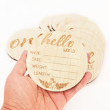 Milestone Discs Set featuring 14 engraved Kiwiana-inspired wooden discs for capturing baby's first year memories.