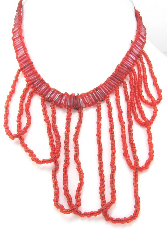 Stunning red necklace with a draping front, perfect for adding elegance to any outfit, casual or formal.