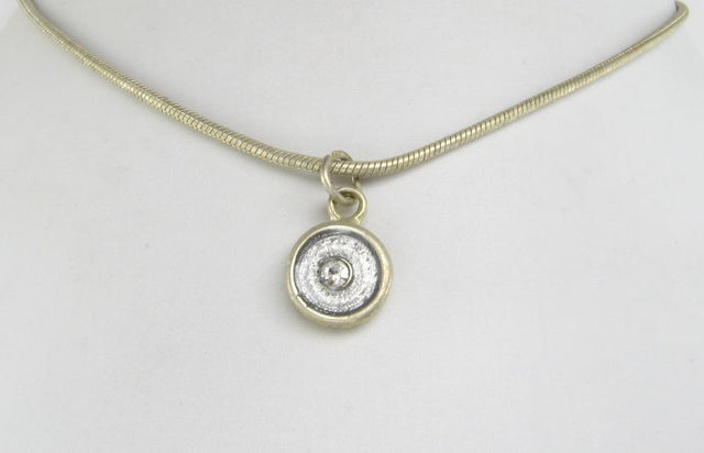 Elegant silver snake chain necklace, 38cm with 5cm extension, perfect for versatile styling and everyday sophistication.