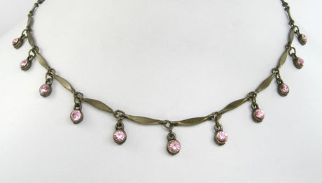 Elegant Brass Pink Multi Drop Necklace featuring pink tones and a 41cm length with a 6cm extender for versatile style.