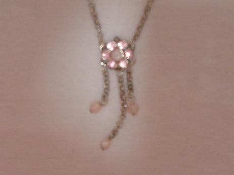 Stunning pink diamante necklace featuring a 3 Drop daisy design, perfect for adding elegance to any outfit.