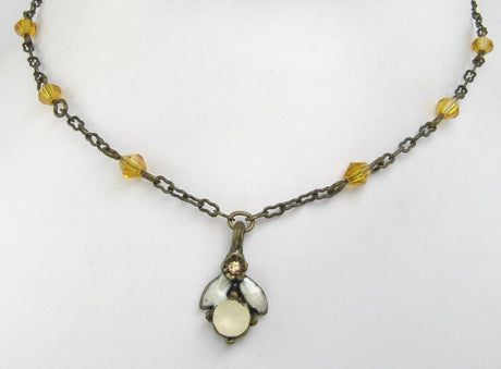 Delicate yellow bee pendant necklace, symbolizing nature's beauty and empowerment, perfect for any occasion.