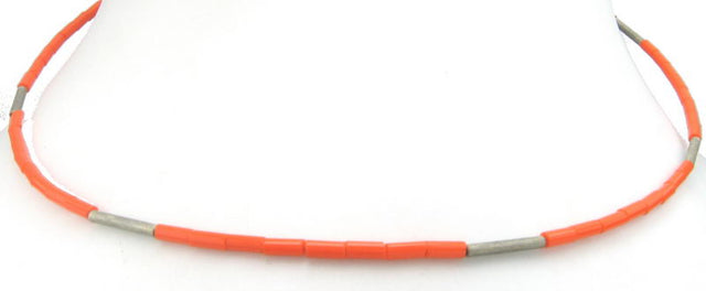 1 Strand Orange Bead Necklace with Silver accents, perfect for elevating any outfit with color and elegance.