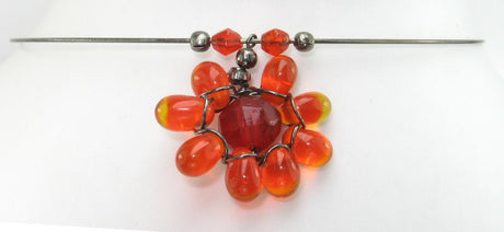 Vibrant orange Beaded Daisy Necklace featuring cheerful daisy designs, perfect for nature-inspired fashion and versatile outfits.