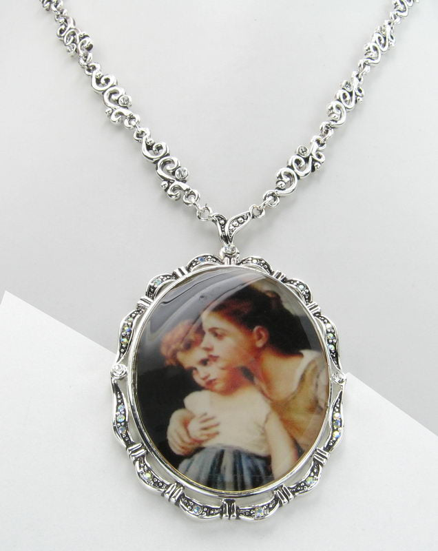 Elegant silver necklace featuring two sisters embracing, symbolizing the unbreakable bond of sisterhood.