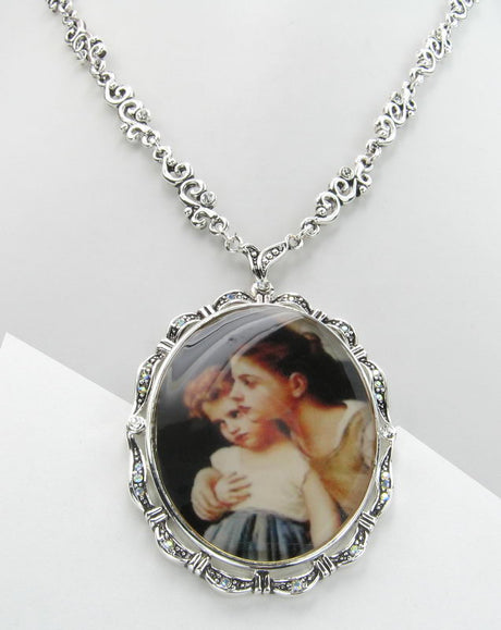 Elegant silver necklace featuring two sisters embracing, symbolizing the unbreakable bond of sisterhood.