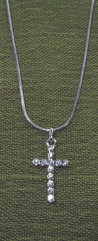 Elegant crystal cross necklace embodying faith and style, perfect for daily wear and special occasions.