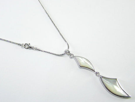 Elegant Mother of Pearl necklace on a platinum chain, perfect for adding sophistication to any outfit.