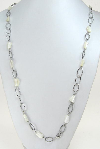 Elegant White Shell Necklace crafted from authentic seashells, perfect for enhancing any outfit with a beachy charm.