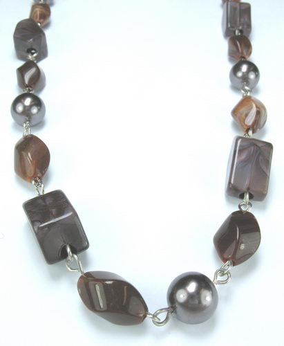 Brown Resin Necklace with handcrafted design, showcasing elegant hues for versatile styling and long-lasting wear.