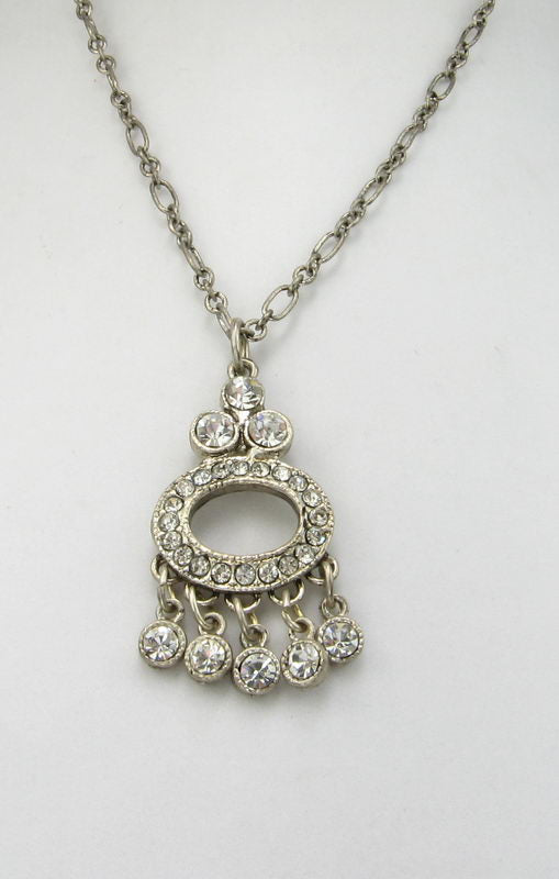 Elegant necklace featuring an oval diamond pendant, perfect for enhancing any outfit with timeless sophistication.