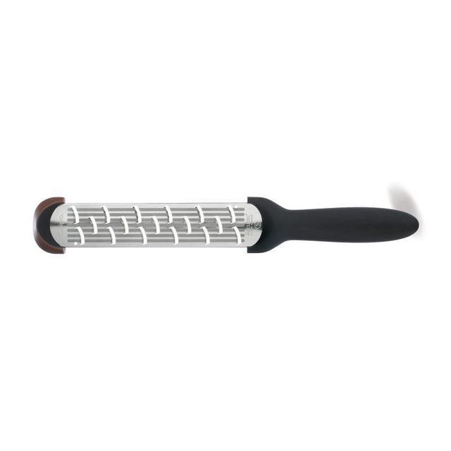 Cuisipro SGT Shaver Rasp Grater with ergonomic handle and grooved surface for effortless food grating and measurement.