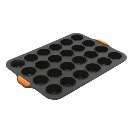 Bakemaster Silicone Mini Muffin Pan with 24 cups, ergonomic handles, and non-toxic flexible silicone for easy baking.