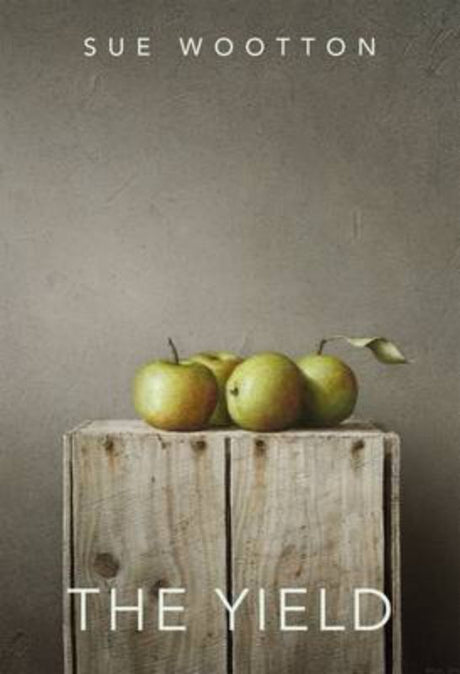 Paperback poetry collection "The Yield" by Sue Wootton featuring 84 evocative poems exploring life's interconnected themes.