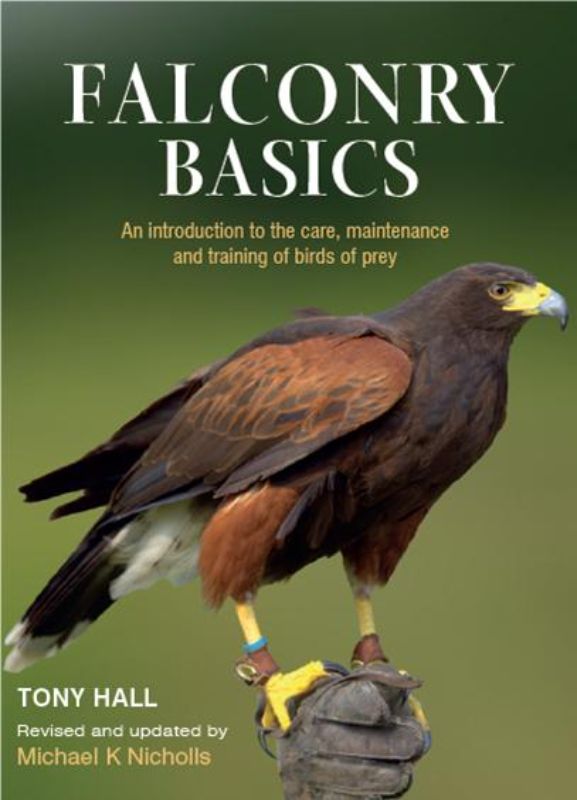 "Hardback guide 'Falconry Basics' by Tony Hall, outlining training, care, and techniques for falconers and bird enthusiasts."