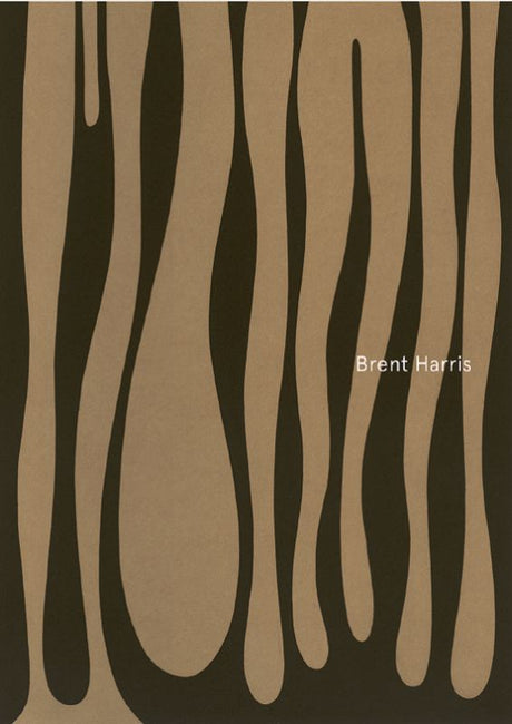Hardback catalogue featuring Brent Harris's striking artwork and insights from prominent art writers, exploring trauma and subconscious expression.