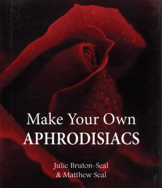 A beautifully designed book cover featuring "Make Your Own Aphrodisiacs," highlighting sensual recipes for love-enhancing dishes.