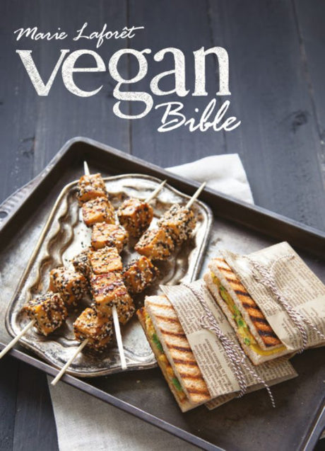 Comprehensive vegan cookbook featuring 500+ recipes by Marie Laforet, celebrating plant-based culinary creativity.